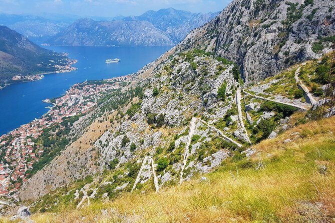 Hiking downhill from Krstac to Kotor, visit San Giovanni fortress - Stop 2: Spiljari village break with family products and local conversation