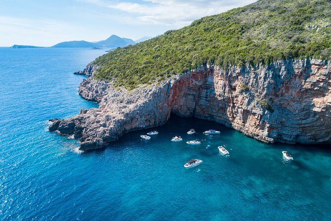 Kotor Bay Escape: Blue Cave, Beach & Swimming Time - The Pass-By Moments: Perast and Mamula Island from the water