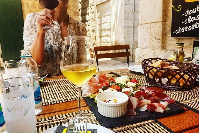 Private Walking tour with Wine and Food - Getting your bearings at the Sea Gate and the Old Town circuit